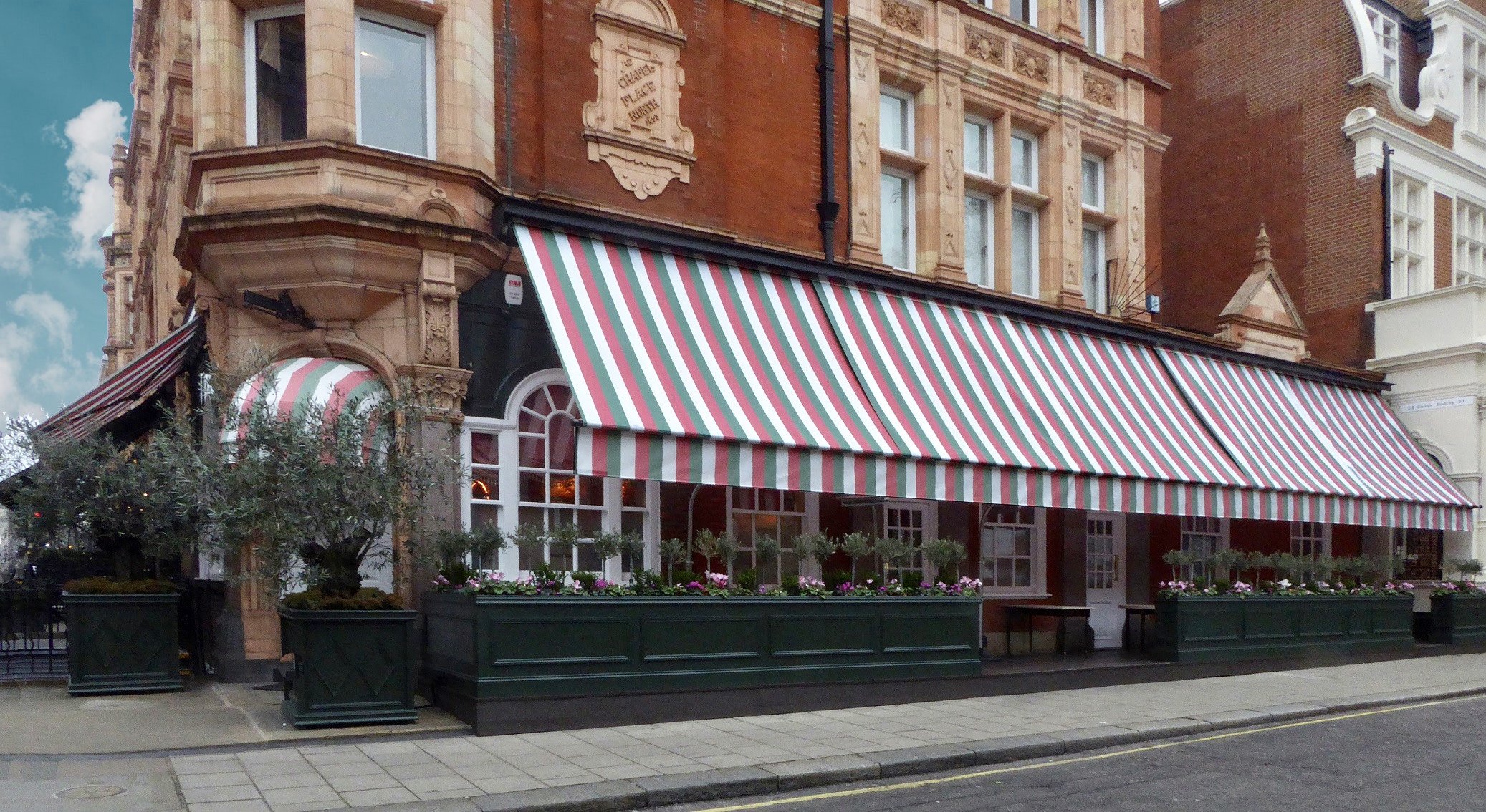 Bespoke awning installation Harry's Bar Morco Blinds